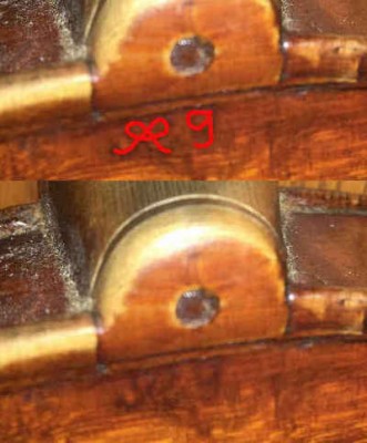 What appear to be Moritz Gläsel's initials inscribed on the back of the violin above the upper block.